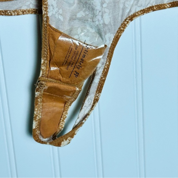 FREE PEOPLE Turnt Surplice Bodysuit in a copper floral print Medium NWT - Picture 8 of 11